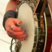 Fingers picking banjo