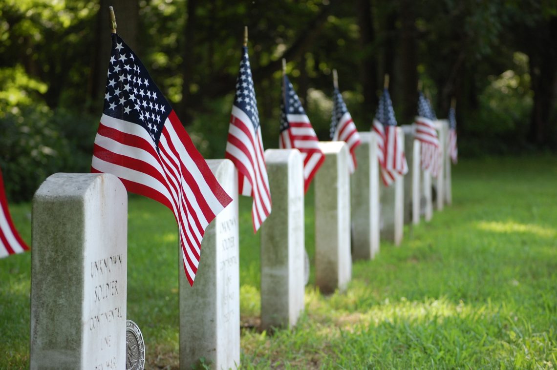 Memorial Day American flags in cemetery.www.sallymatheny.com