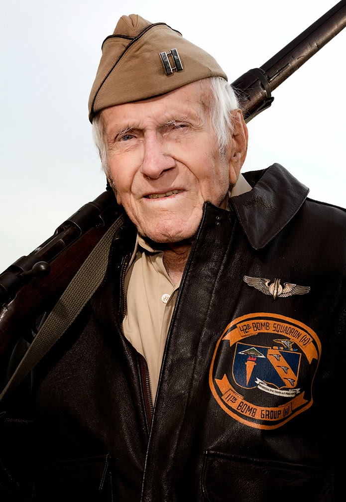 Older Louis Zamperini in bomber jacket