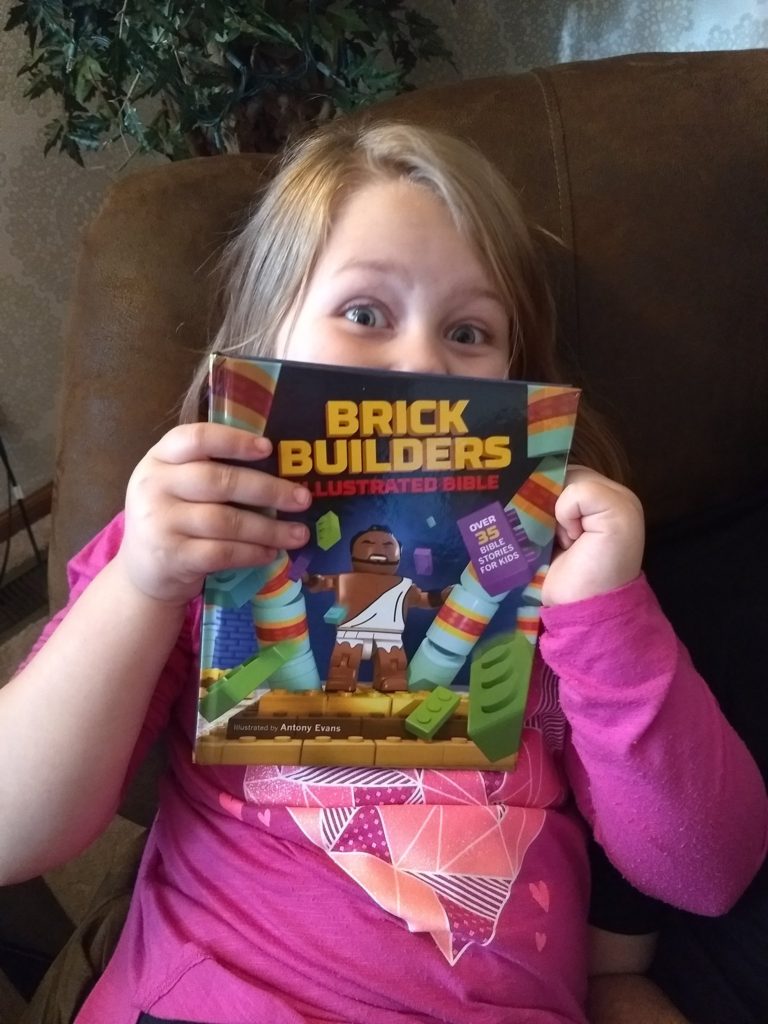 Little girl with book