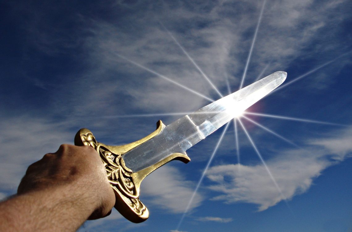 Sword held up to sky