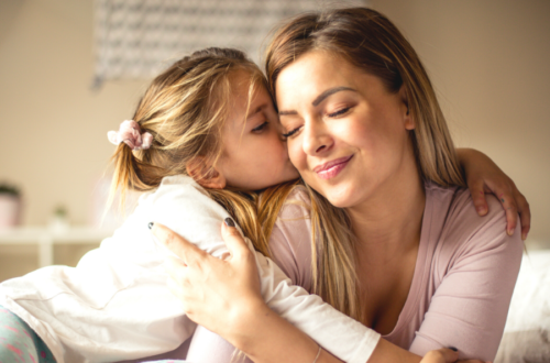 Mom Receiving a Pancake Kiss