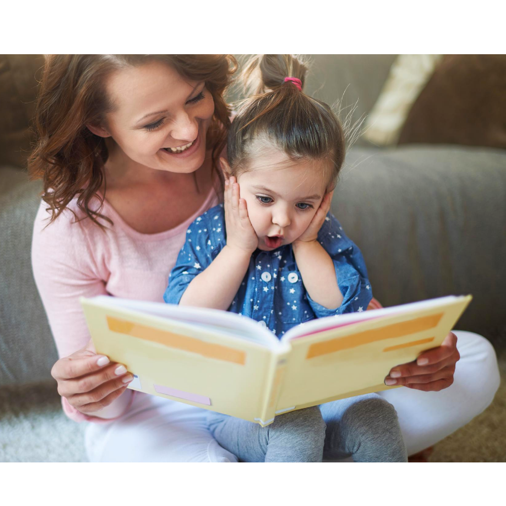 A mom using the power of story to tell the next generation not to fear. Reading book.