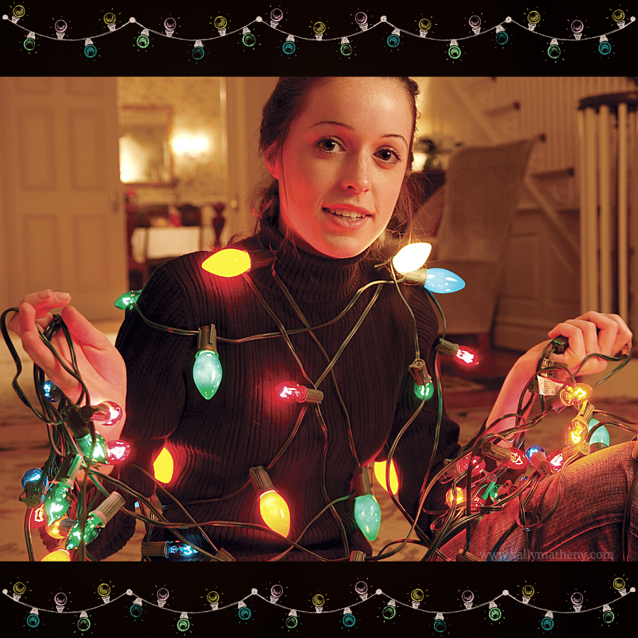Woman with tangled Christmas lights. FIX-HER-UPPER CHRISTMAS