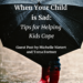 Photo of child's legs and wearing red rain boots, standing under a huge black umbrella. Text: When Your Child is Sad: Tipe for Helping Kids Cope. Guest Post by Michelle Nietert and Tama Fortner. www.sallymatheny.com