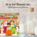 Mason jars will milk and straws. Book cover of M is for Mason Jar.