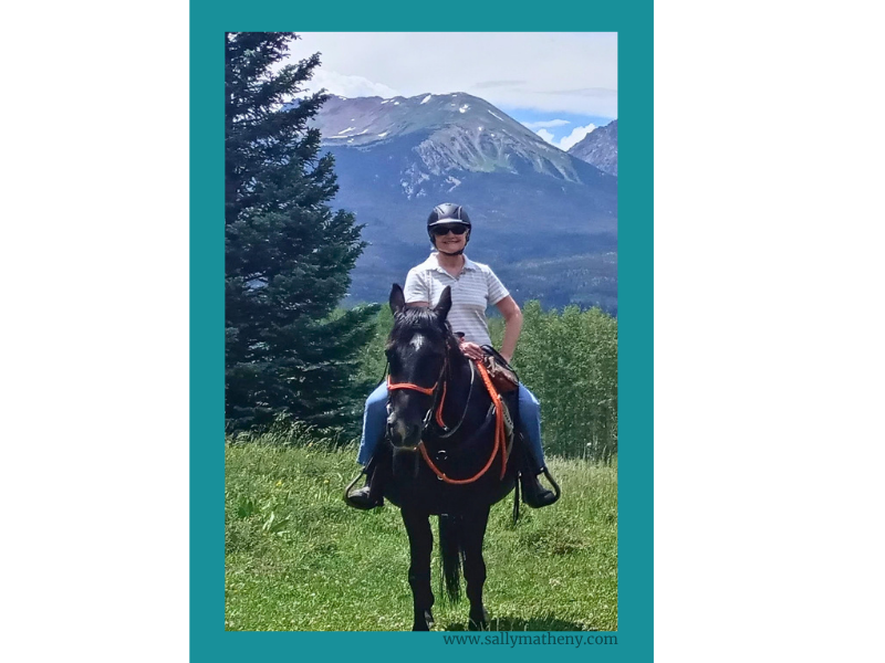 Kathy O'Neill riding a horse.